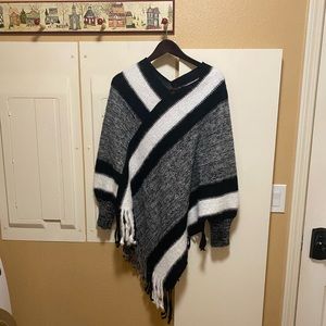 Poncho with long sleeves. New -never worn. $15.